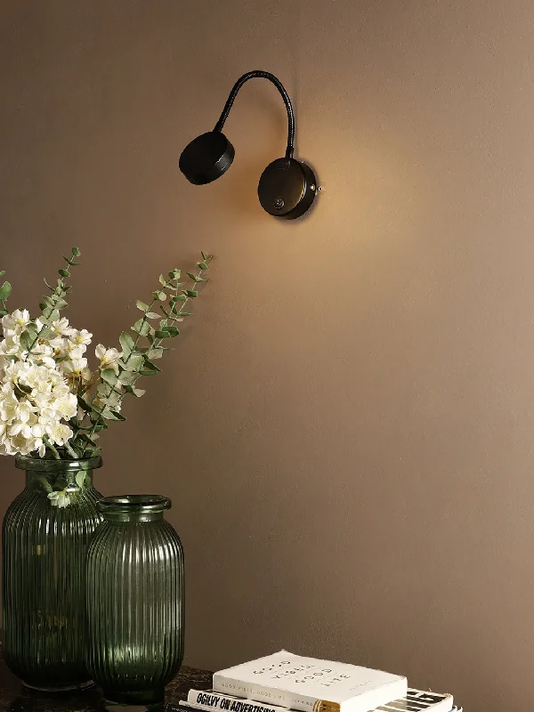 gothic style wall lamps with dark finishes for a mysterious libraryArnel D Wall Light