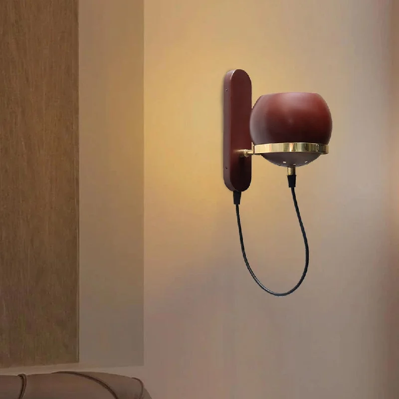 mid - century modern wall lamps with iconic shapes for a stylish studyBowler