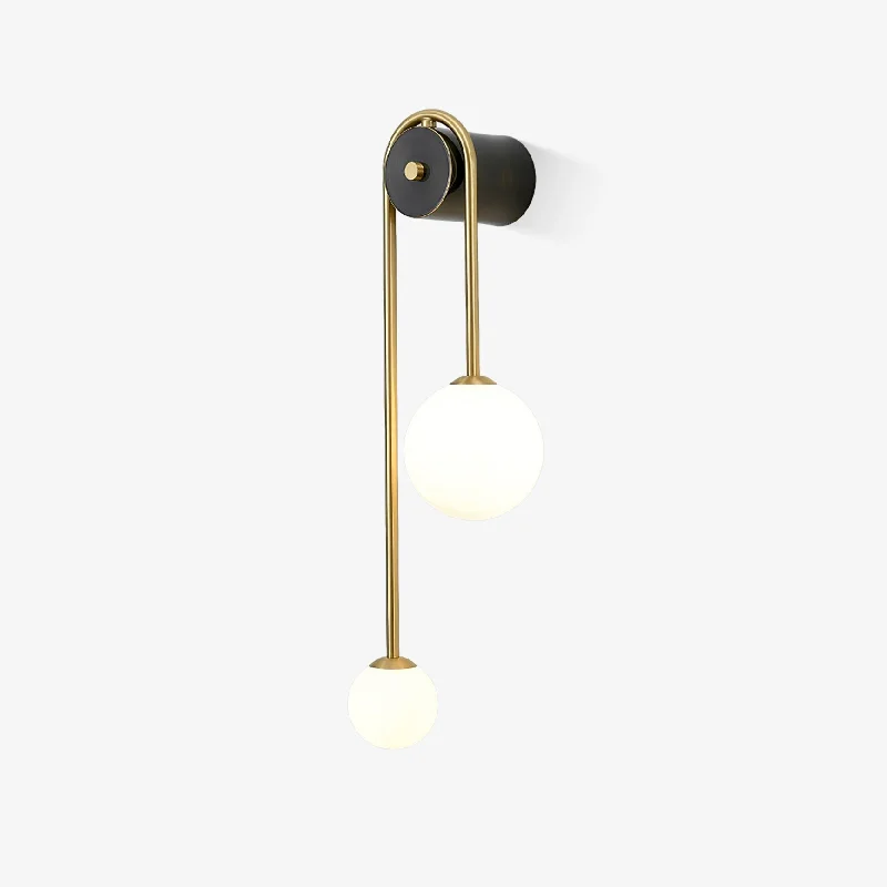 metal wall lamps with a matte black finish for a sleek and modern lookBrass Arc Wall Light