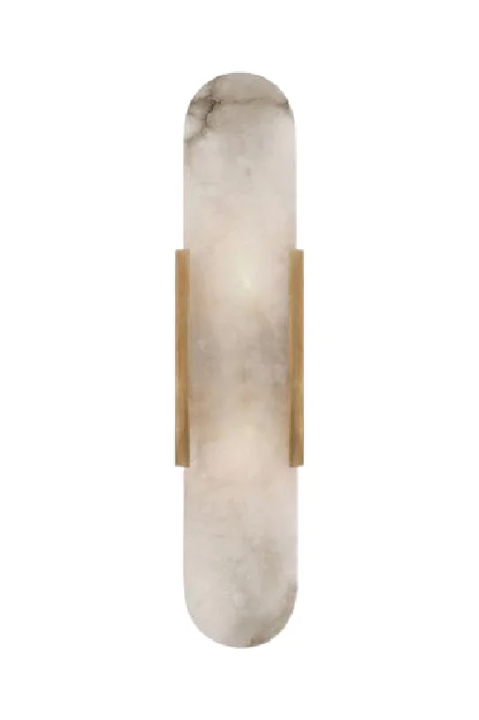 wood wall lamps with natural grain for a warm and organic feelElongated Alabaster Wall Light | Andrew Martin Melange