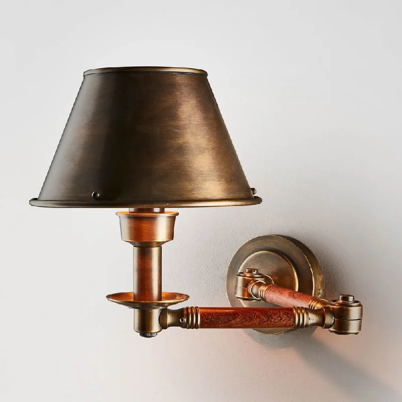 metal wall lamps with a matte black finish for a sleek and modern lookBenton Swing Arm Sconce Antique Brass