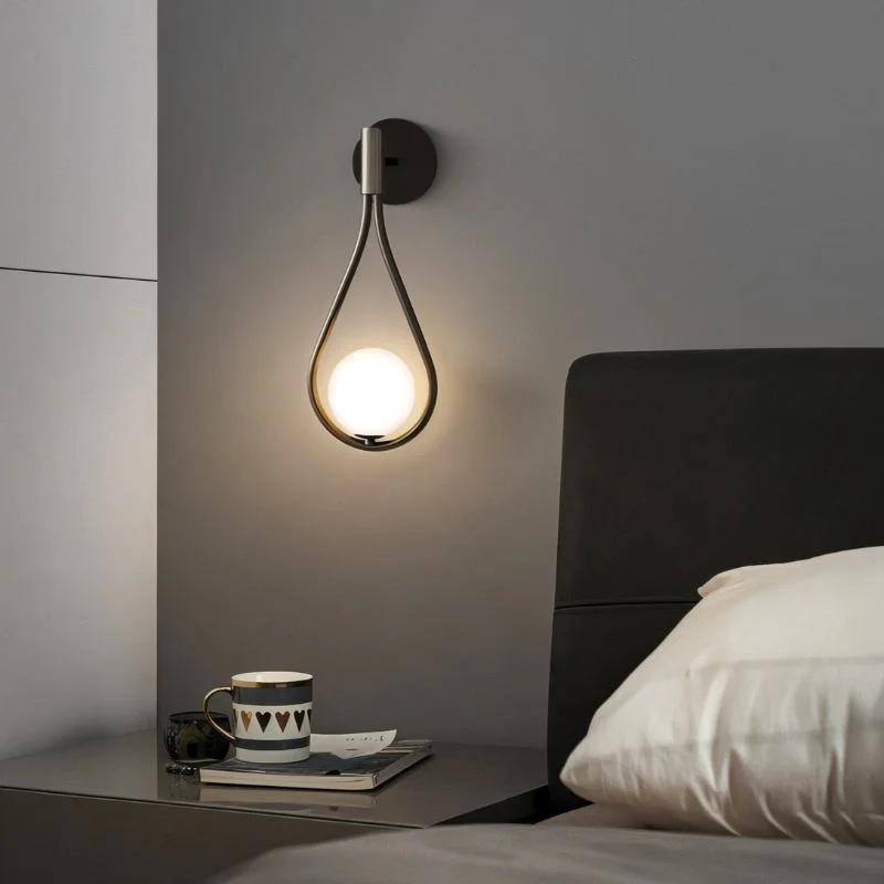 leather wall lamps with a distressed texture for a rugged and stylish lookEmbrace Wall Lamp