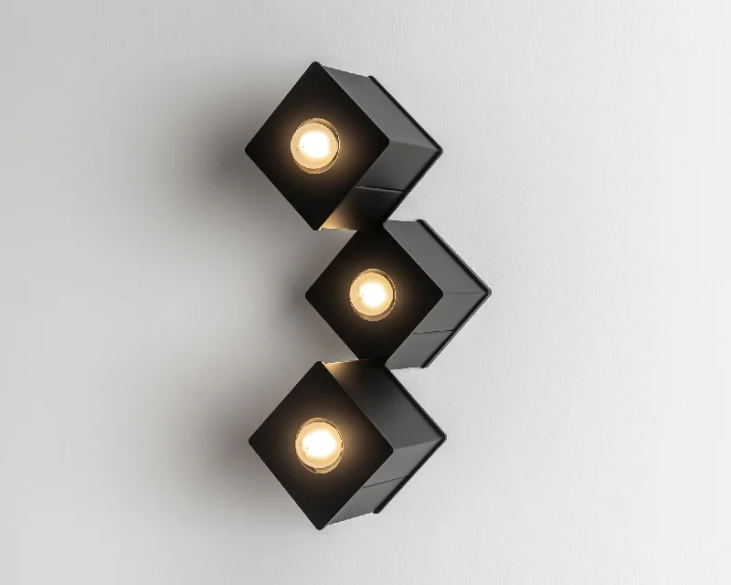 metal wall lamps with a matte black finish for a sleek and modern lookTetra III Flush Mount